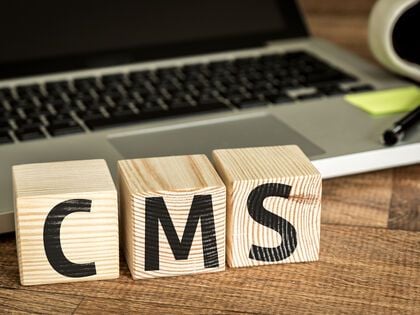 Blocks spelling out "CMS"